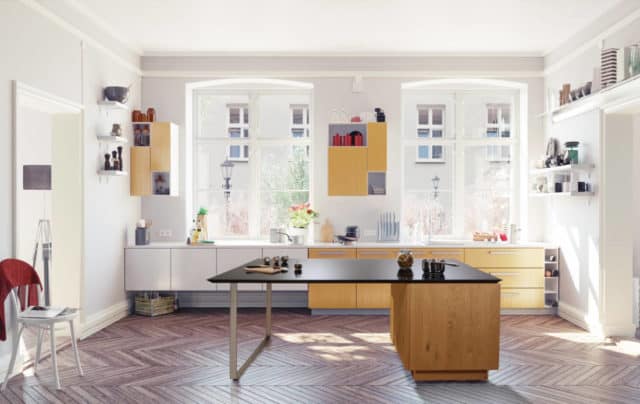 Black glass-ceramic island with cooking surface and countertop.