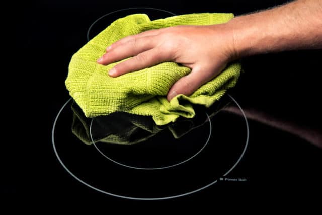 Knowing how to clean a cooktop includes using the right cleaning materials.